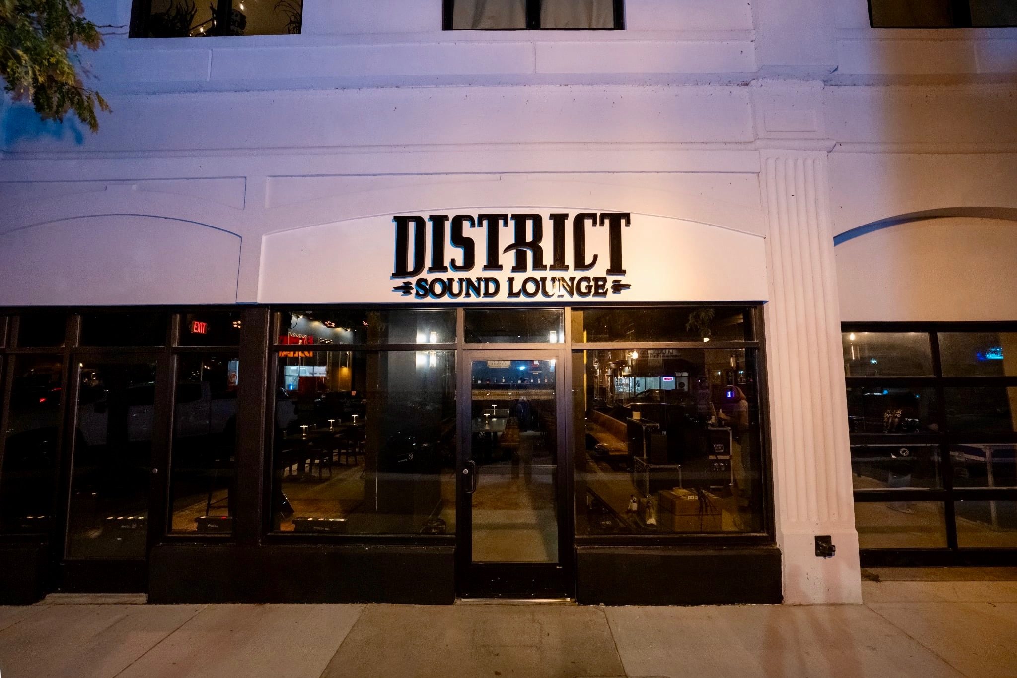 The District Sound Lounge storefront at night in Downtown Wyandotte